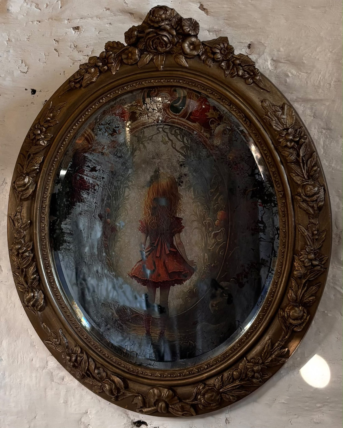 Alice in Wonderland Mirror with ornate gold frame