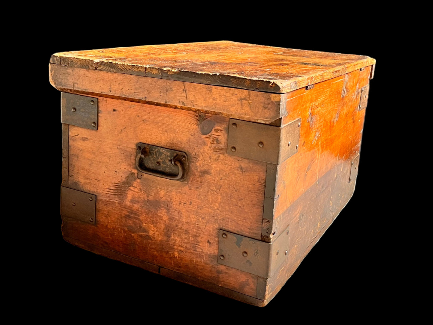 Vintage wooden trunk with metal clasps on a gray background