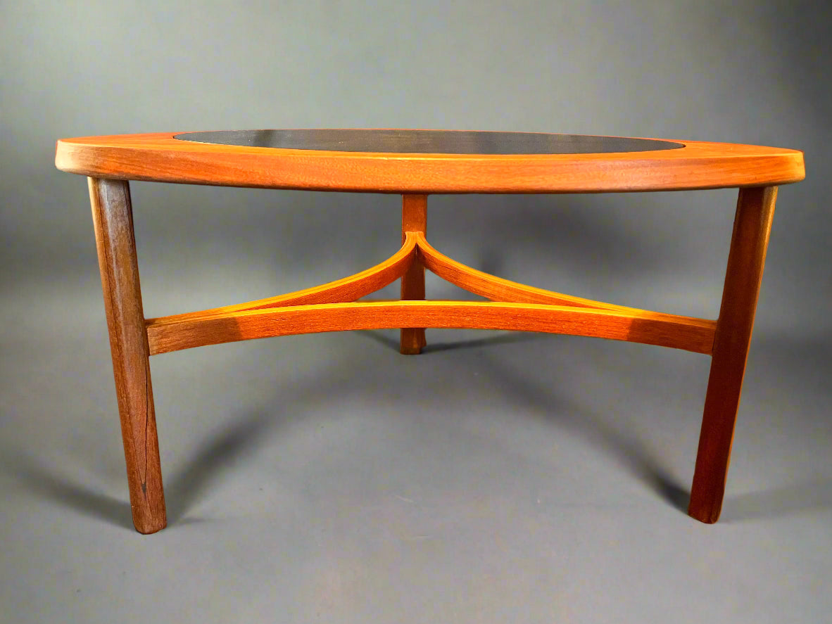 Vintage “Astro” Nathan triangular shaped teak and glass coffee table