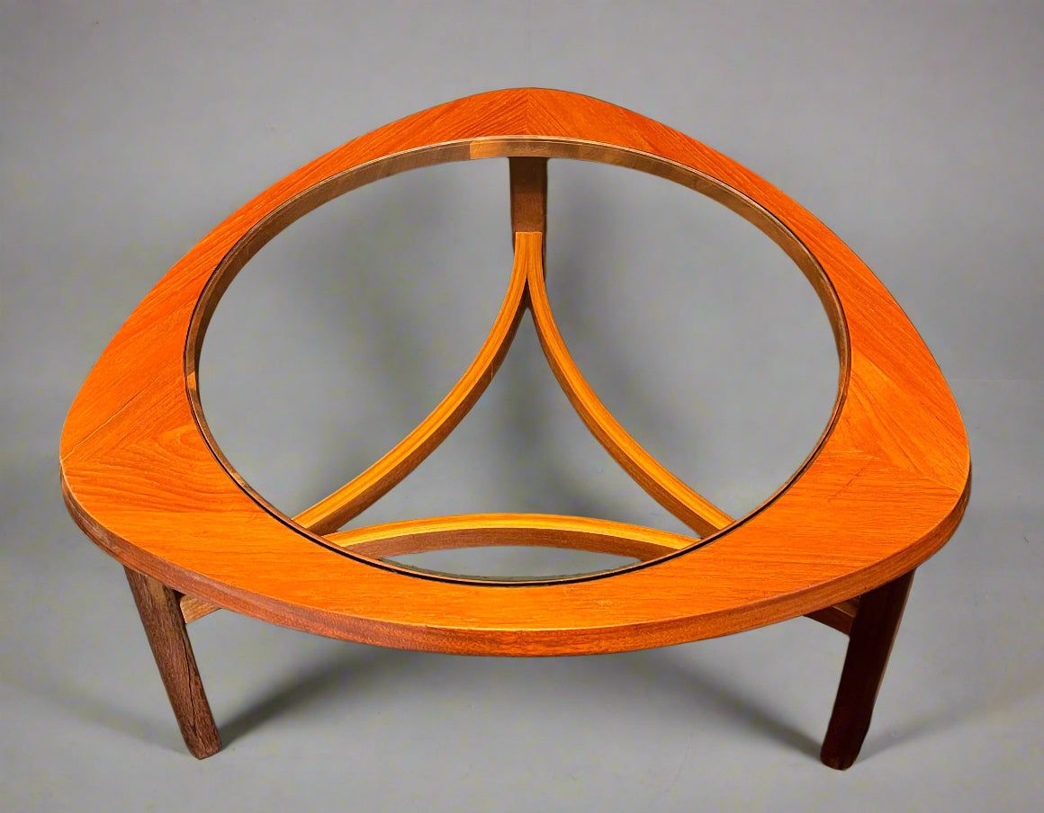 Vintage “Astro” Nathan triangular shaped teak and glass coffee table