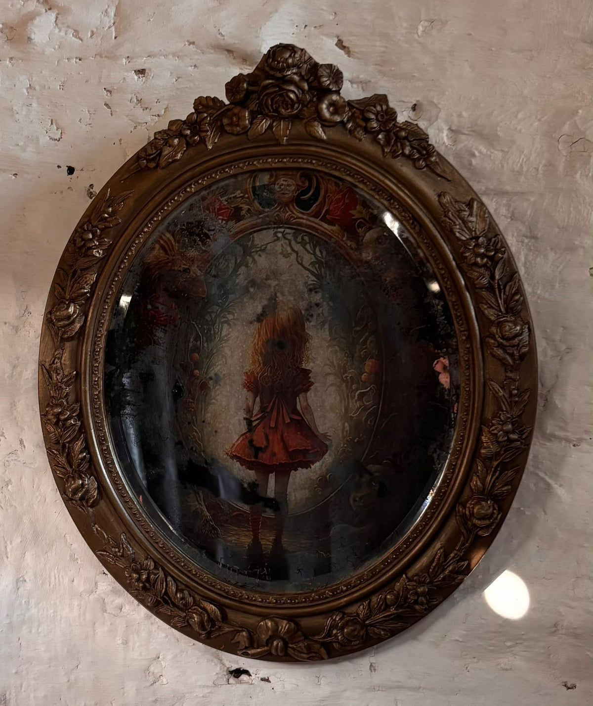 Alice in Wonderland Mirror with ornate gold frame